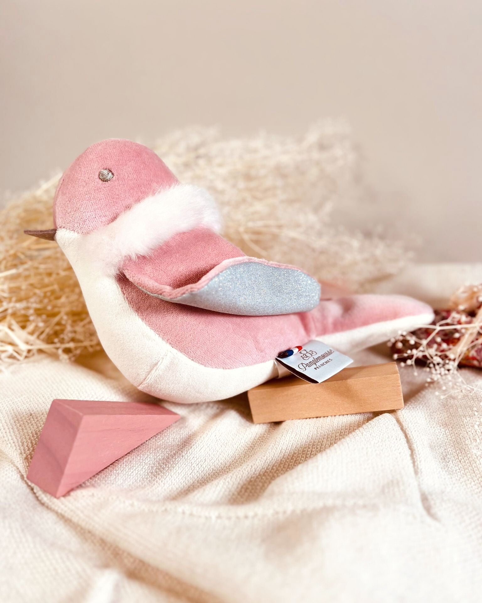 Oiseau d'éveil Rose