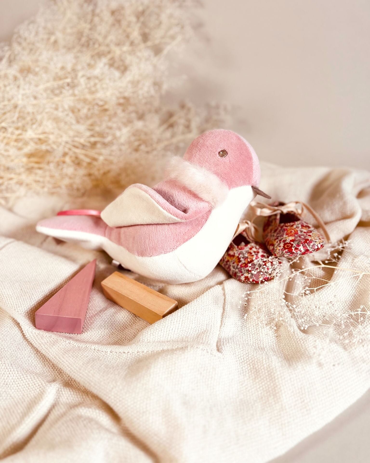 Oiseau d'éveil Rose